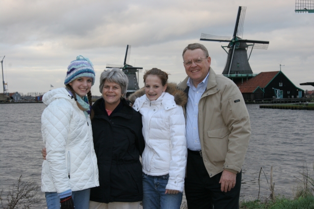 On the dyke in Holland,
Mike and Patty (Wenzell) Alexander with daughters, Faith and Laura    12-06
